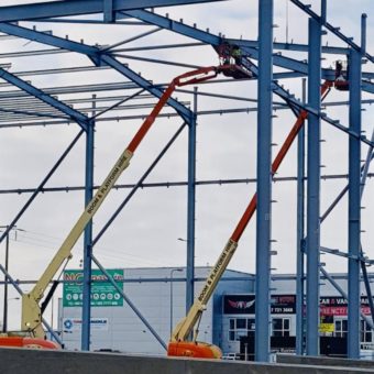 Boom-and-Platform-660sj-Booms-in-full-flight-steel-erecting